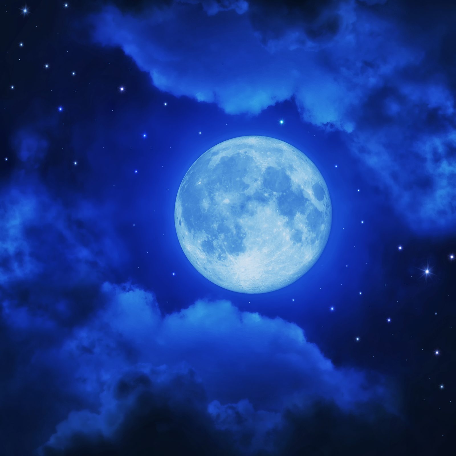 Moon through parting clouds