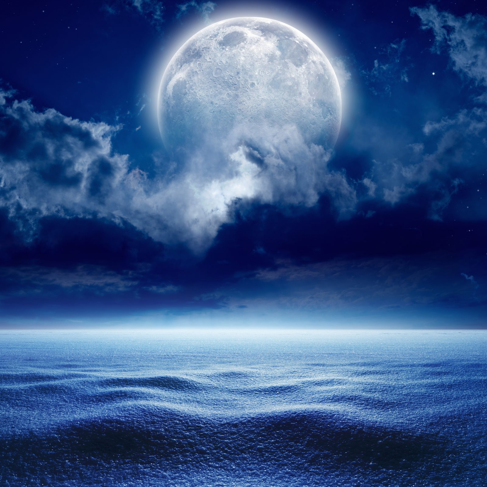 Full moon over still water